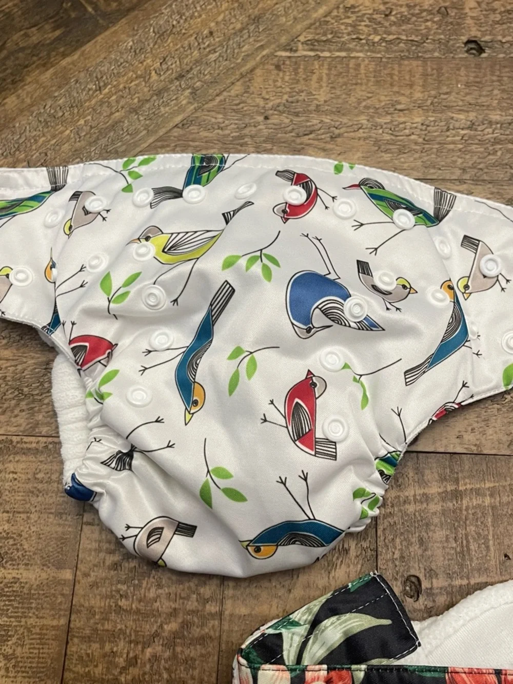 Sunbaby reusable cloth baby diapers with adjustable snaps to grow with baby